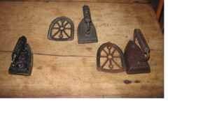 2 irons with trivets and 1 without a trivet