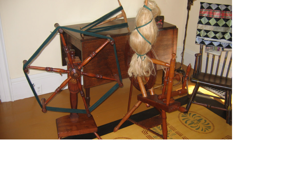 spinning wheel with flax holder, swift, and niddy-noddy